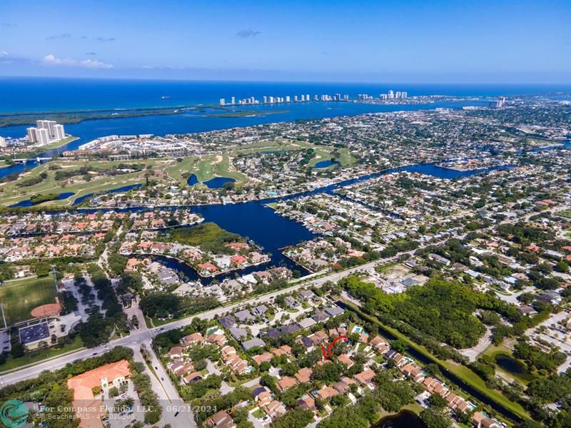 1088 Raintree Drive Palm Beach Gardens, FL 33410 - Photo 36 of 36 an aerial view of residential building with outdoor space