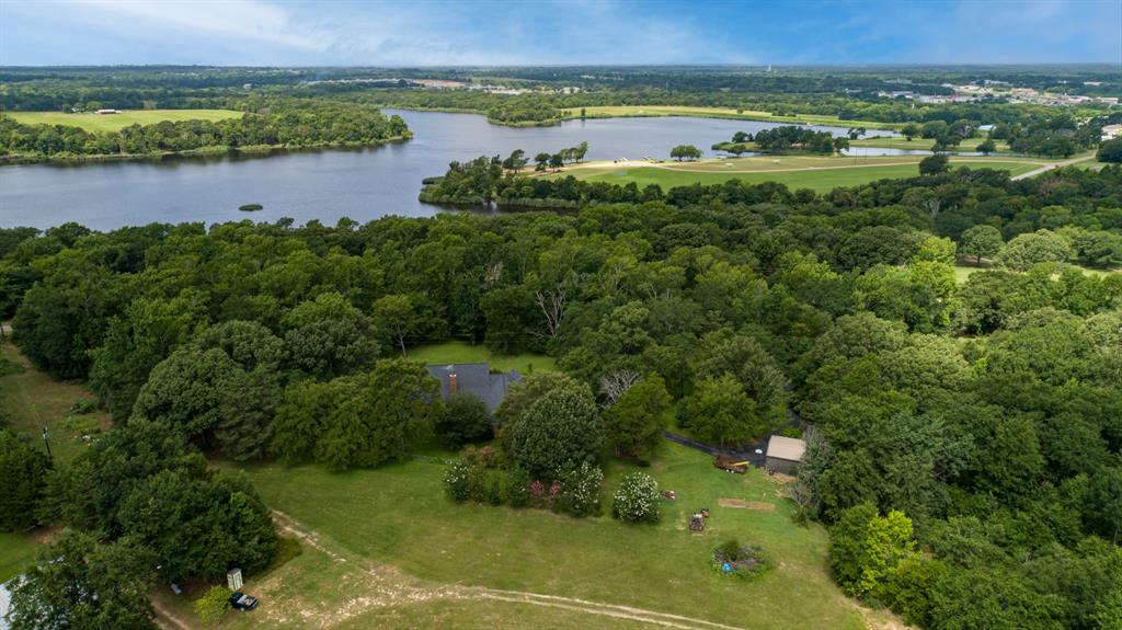 875 Arnold Paul Road Canton, TX 75103 - Photo 32 of 32 an aerial view of a houses with a lake view