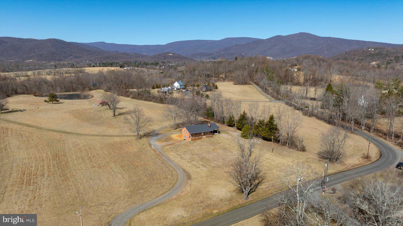 297 Tiger Valley Road Washington, VA 22747 - Photo 38 of 39 a view of a backyard with mountain view