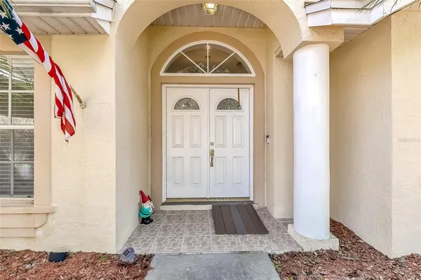 a view of an entryway with a rug