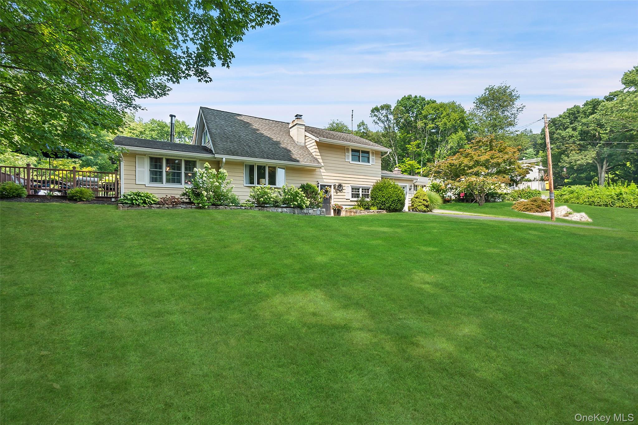 12 Sugar Hill Road North Salem, NY 10560 - Photo 26 of 34 a front view of a house with a garden