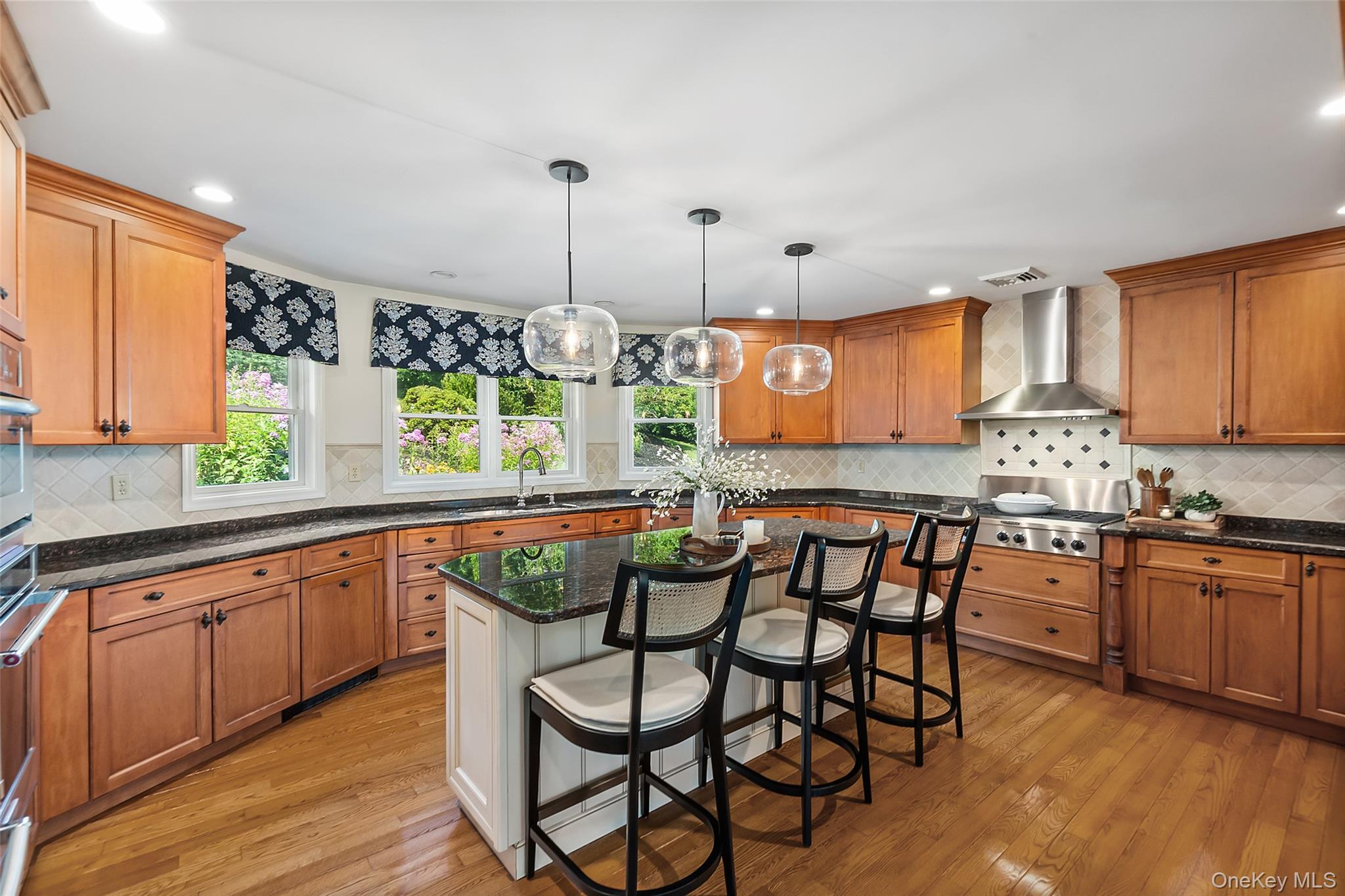 12 Sugar Hill Road North Salem, NY 10560 - Photo 7 of 34 a kitchen with stainless steel appliances granite countertop wooden floor window and cabinets