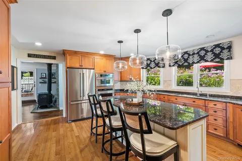 a very nice looking dining room with a table and chairs