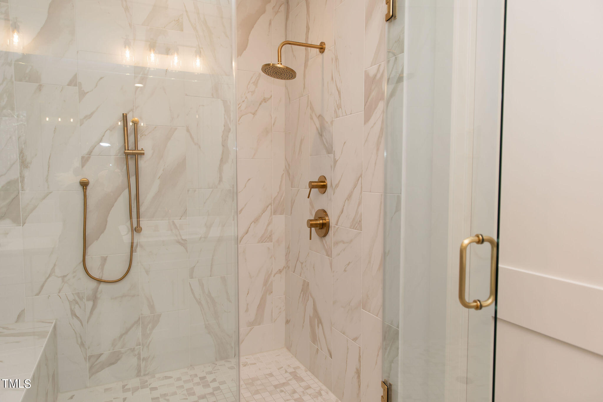 9412 Rawson Avenue Raleigh, NC 27613 - Photo 24 of 53 a bathroom with a shower