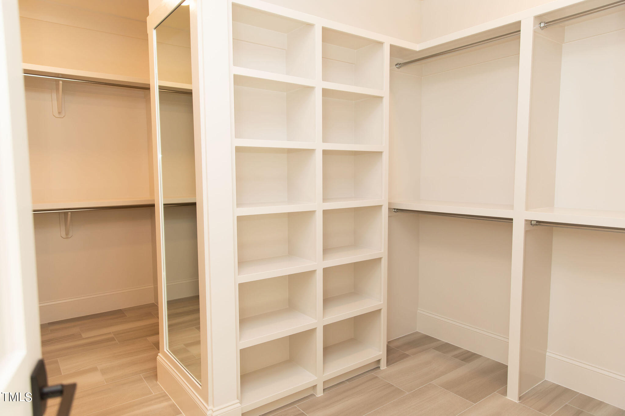 9412 Rawson Avenue Raleigh, NC 27613 - Photo 26 of 53 a view of a room with wooden floor and closet