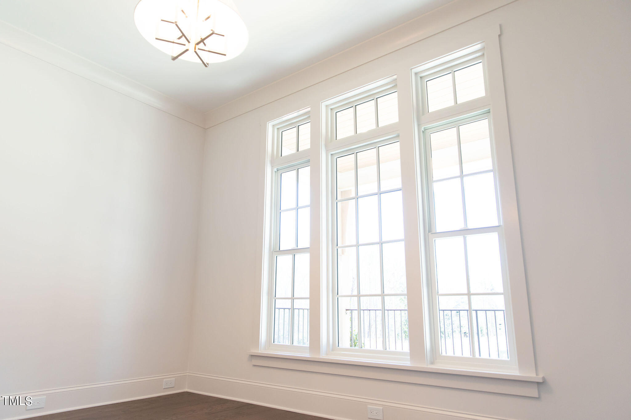 9412 Rawson Avenue Raleigh, NC 27613 - Photo 27 of 53 a view of an empty room with a window