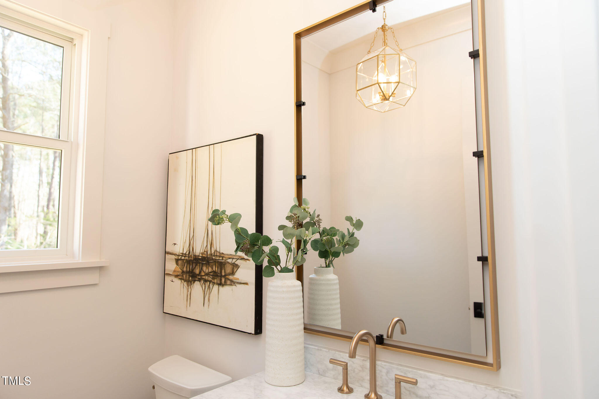 9412 Rawson Avenue Raleigh, NC 27613 - Photo 31 of 53 a bathroom with a shower curtain and a sink