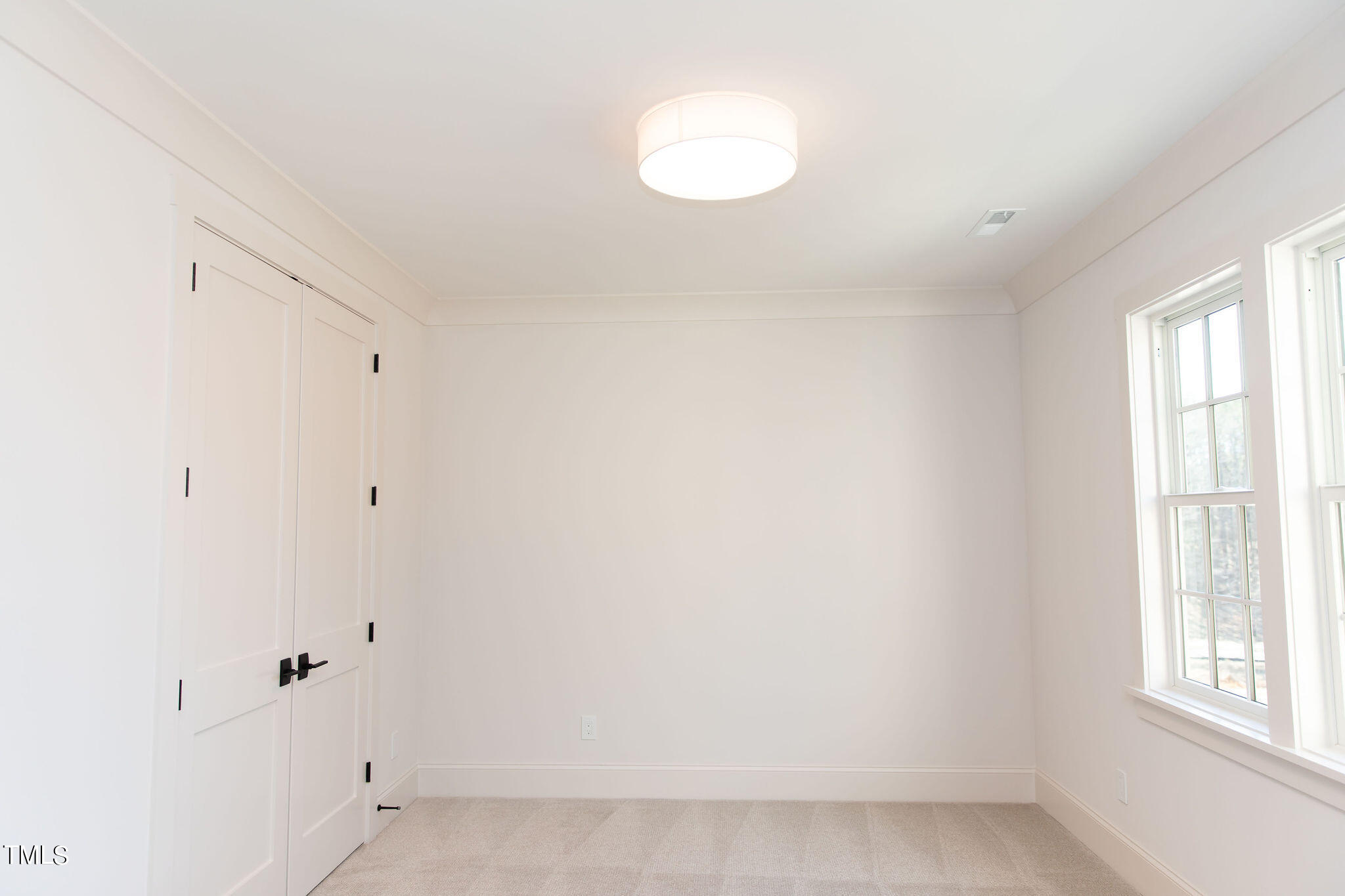 9412 Rawson Avenue Raleigh, NC 27613 - Photo 38 of 53 a view of room with window