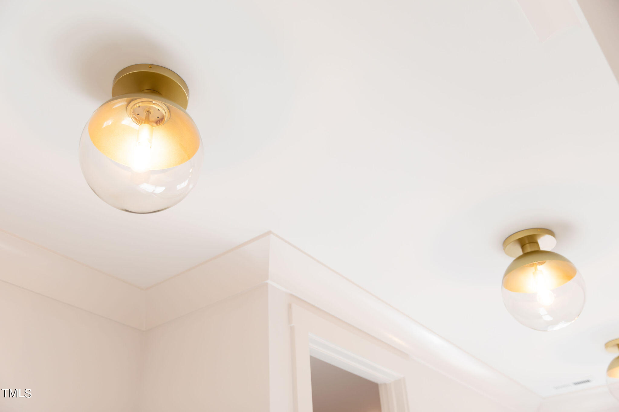 9412 Rawson Avenue Raleigh, NC 27613 - Photo 45 of 53 a bathroom with a sink mirror and vanity