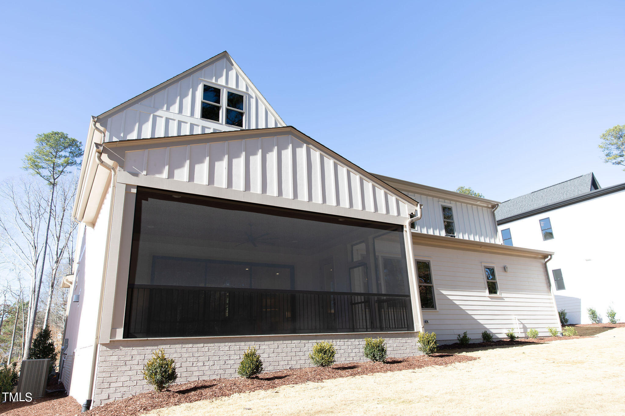 9412 Rawson Avenue Raleigh, NC 27613 - Photo 50 of 53 a front view of a house with a yard