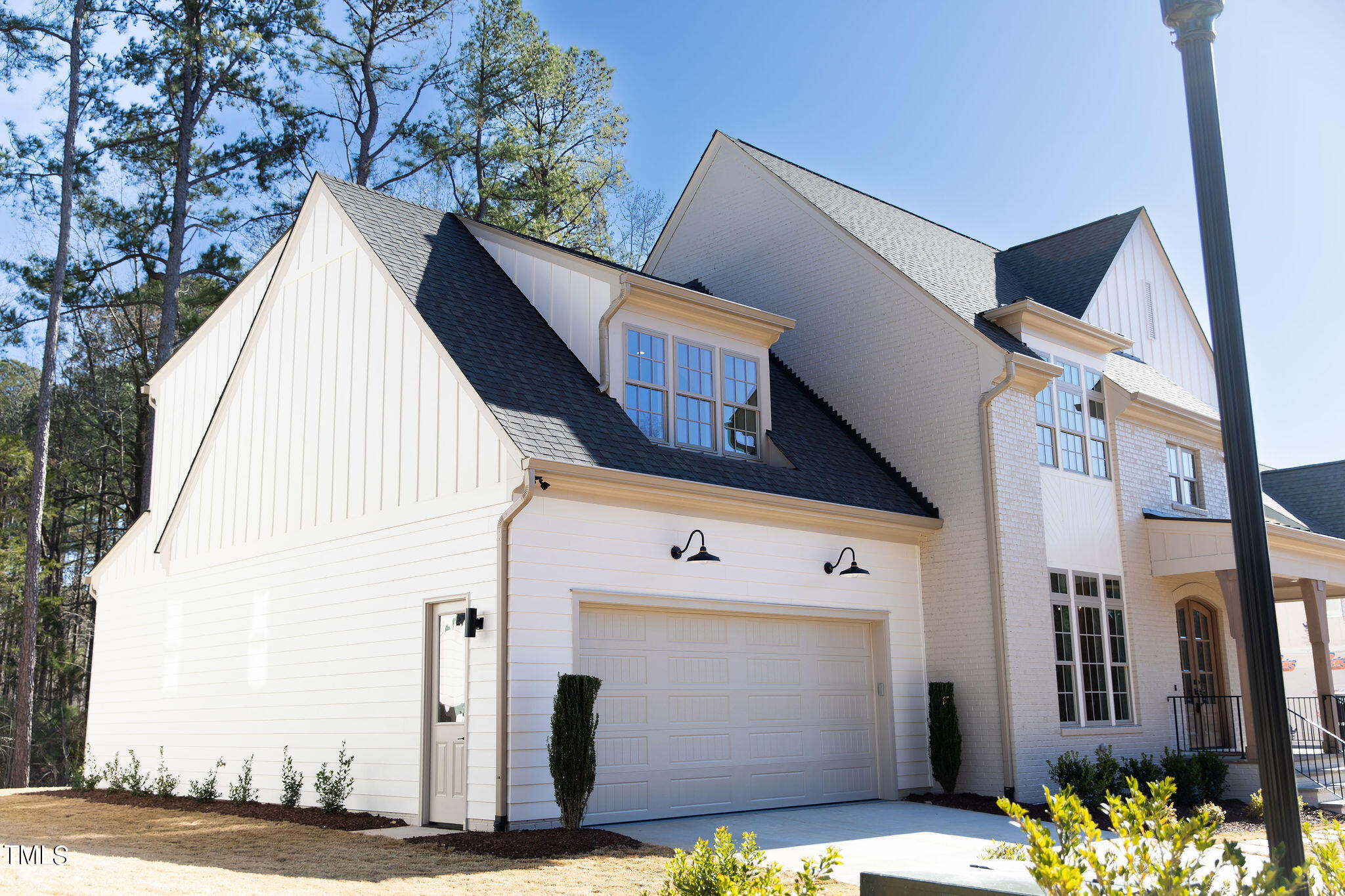 9412 Rawson Avenue Raleigh, NC 27613 - Photo 52 of 53 a view of a house with a door