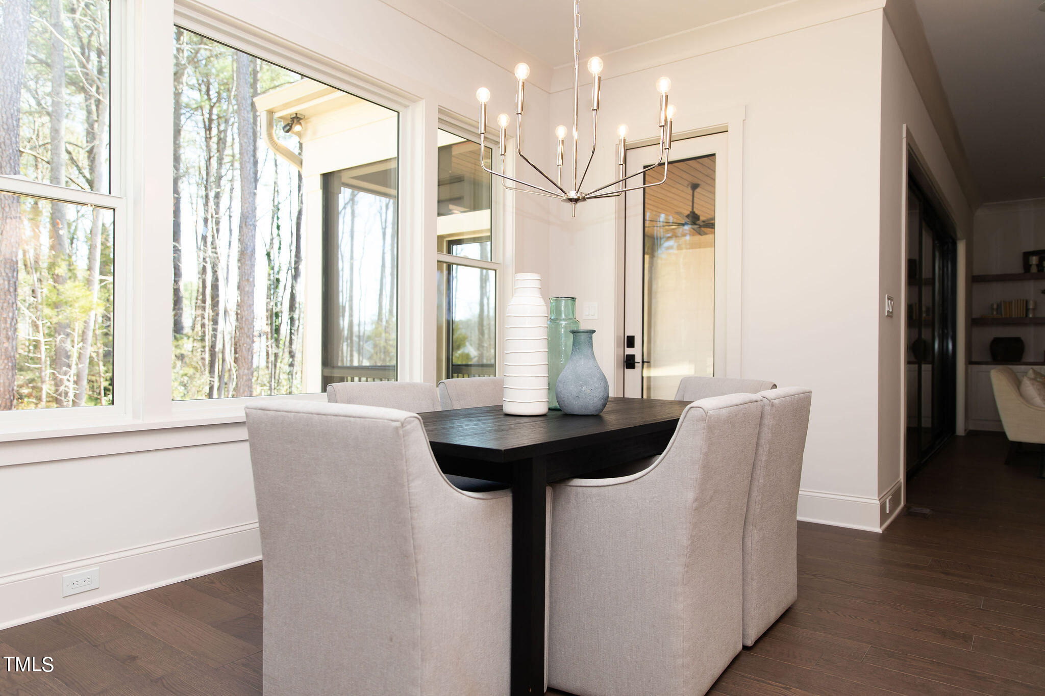 9412 Rawson Avenue Raleigh, NC 27613 - Photo 10 of 53 a dining room with furniture and large windows