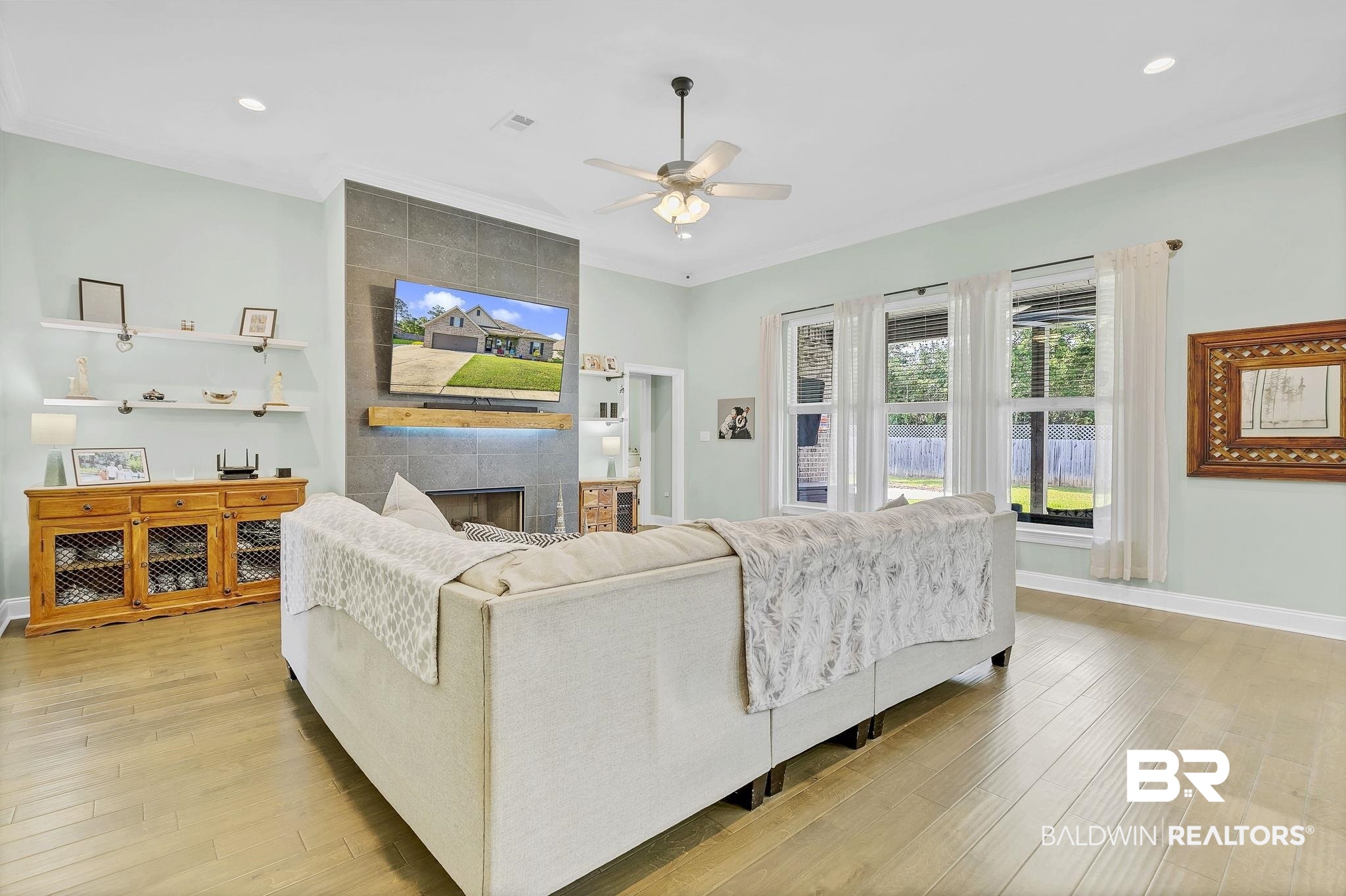 30635 Drayton Court Daphne, AL 36527 - Photo 10 of 51 Living area with a fireplace, ceiling fan, light wood-type flooring, baseboards, and recessed lighting