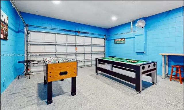 a sitting area with furniture and window