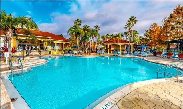 a front view of a building with garden