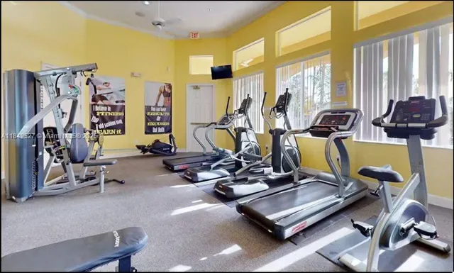 a view of a room with gym equipment