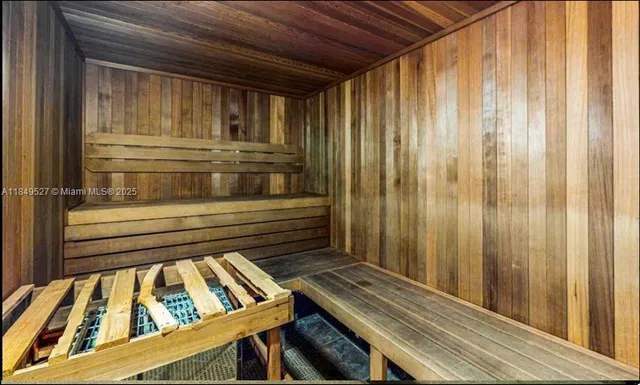 a view of a porch with wooden floor
