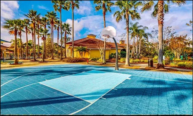 a view of swimming pool with sitting area