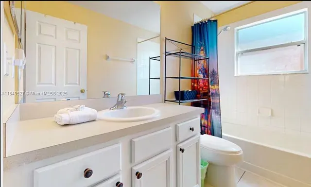 a bathroom with a sink and a toilet