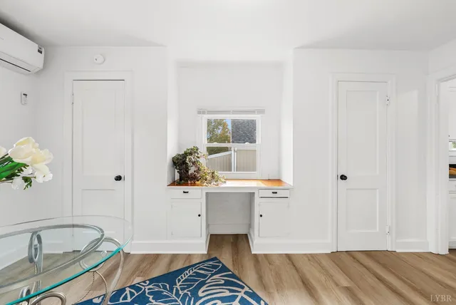a spacious bathroom with a tub sink and mirror