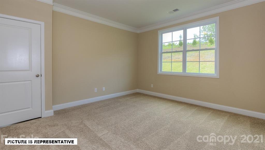 4366 Riverton Loop Denver, NC 28037 - Photo 11 of 14 an empty room with a window