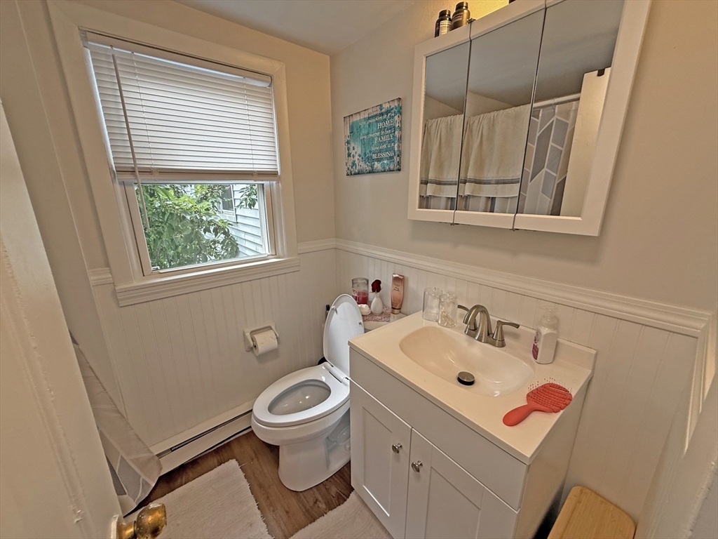 53 Temple Street Whitman, MA 02382 - Photo 14 of 14 a bathroom with a sink and a mirror
