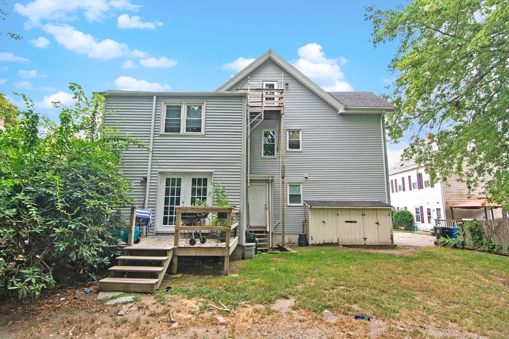 53 Temple Street Whitman, MA 02382 - Photo 3 of 14 a front view of a house with garden