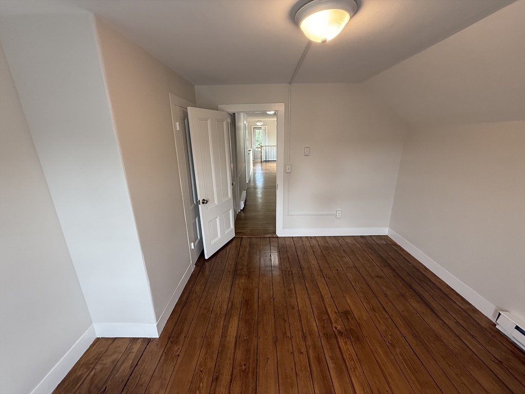 53 Temple Street Whitman, MA 02382 - Photo 9 of 14 a view of a room with wooden floor