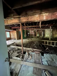 a view of living room filled with furniture