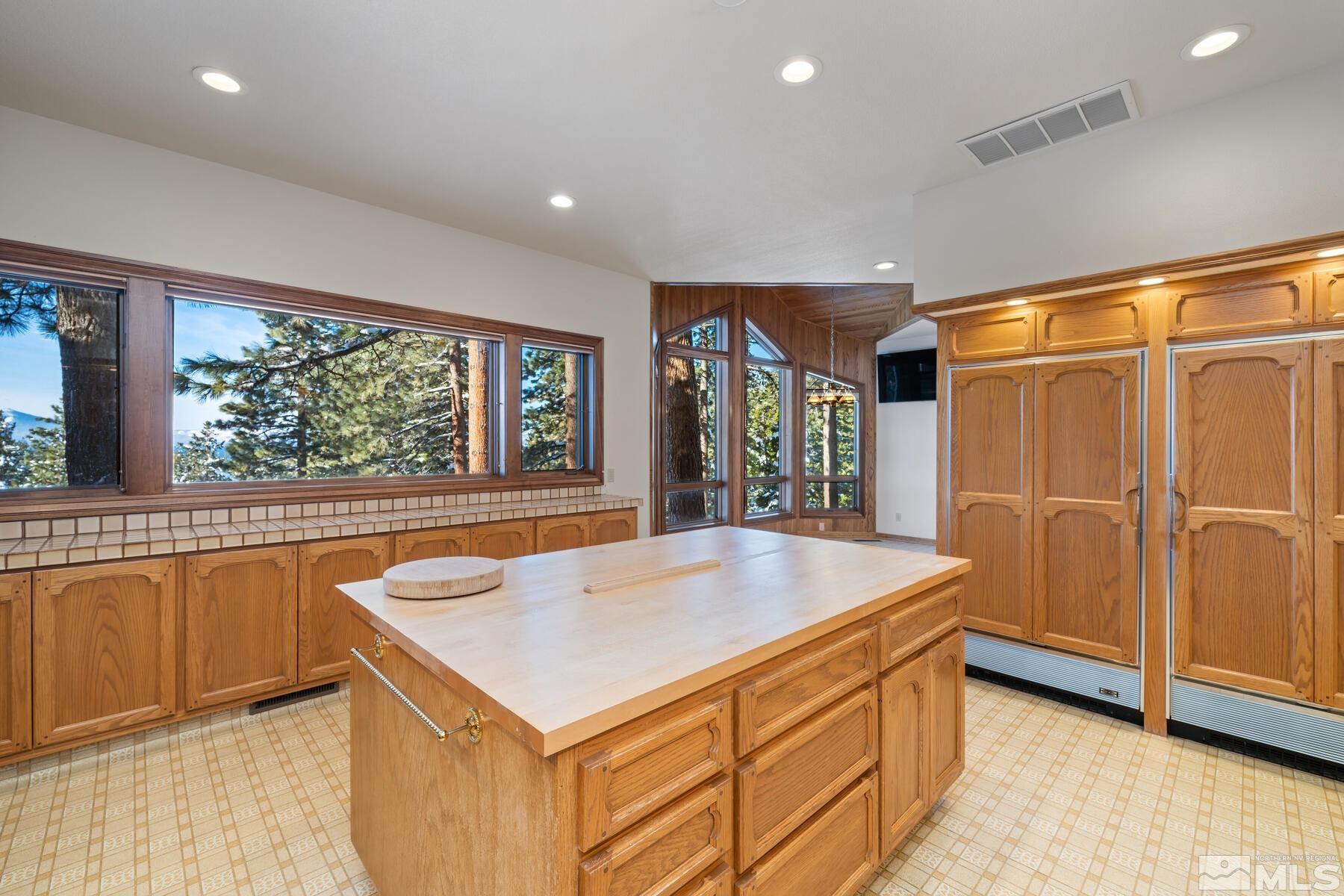 202 Pine Tree Lane Glenbrook, NV 89413 - Photo 14 of 40 a room with pool table and windows