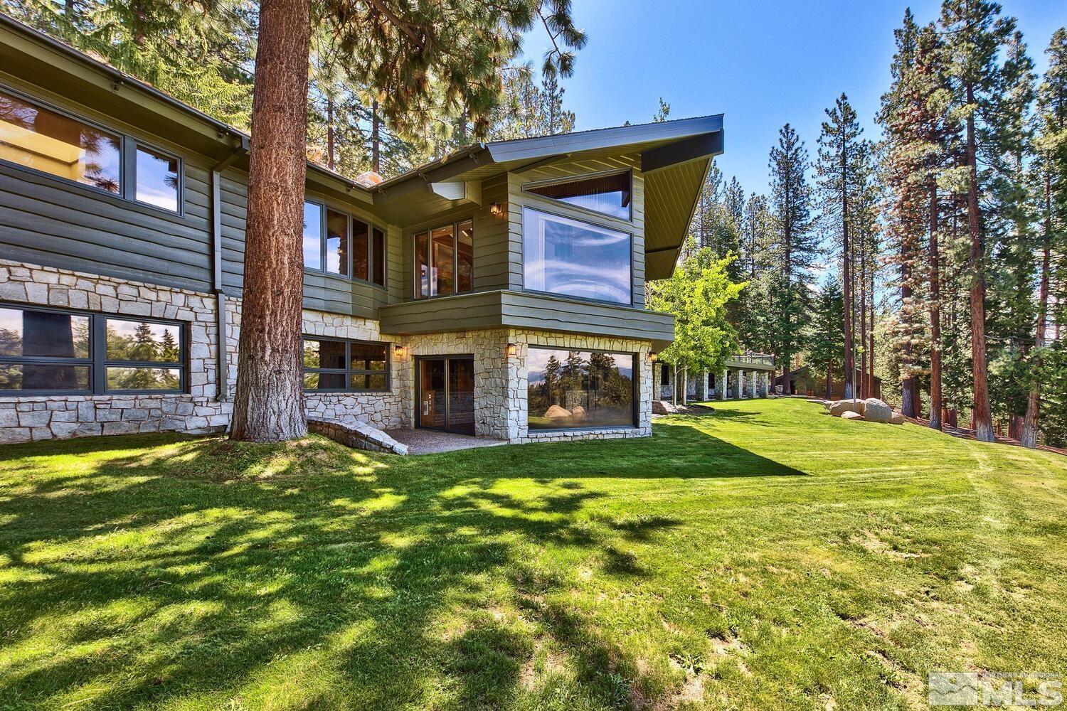 202 Pine Tree Lane Glenbrook, NV 89413 - Photo 25 of 40 a view of a house with pool and sitting area