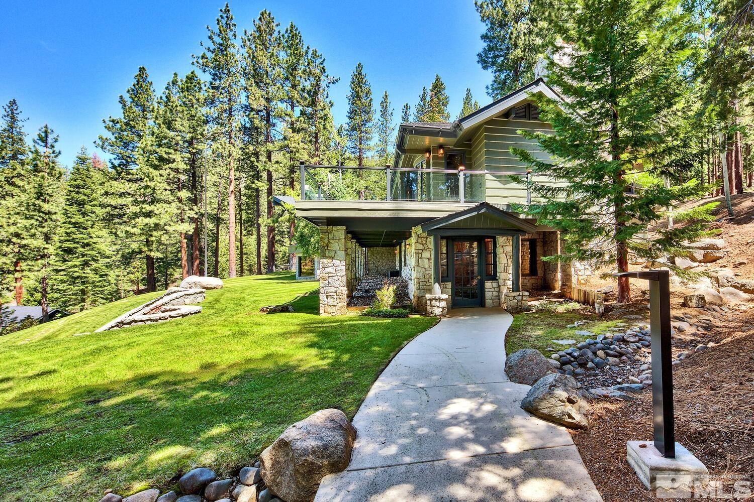 202 Pine Tree Lane Glenbrook, NV 89413 - Photo 36 of 40 a view of a house with backyard and sitting area