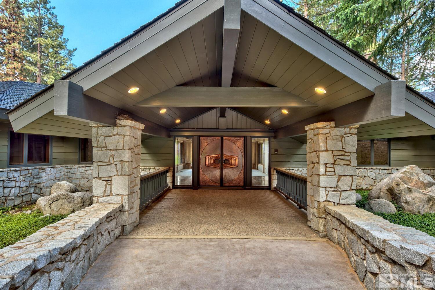 202 Pine Tree Lane Glenbrook, NV 89413 - Photo 5 of 40 a view of a livingroom with a tv