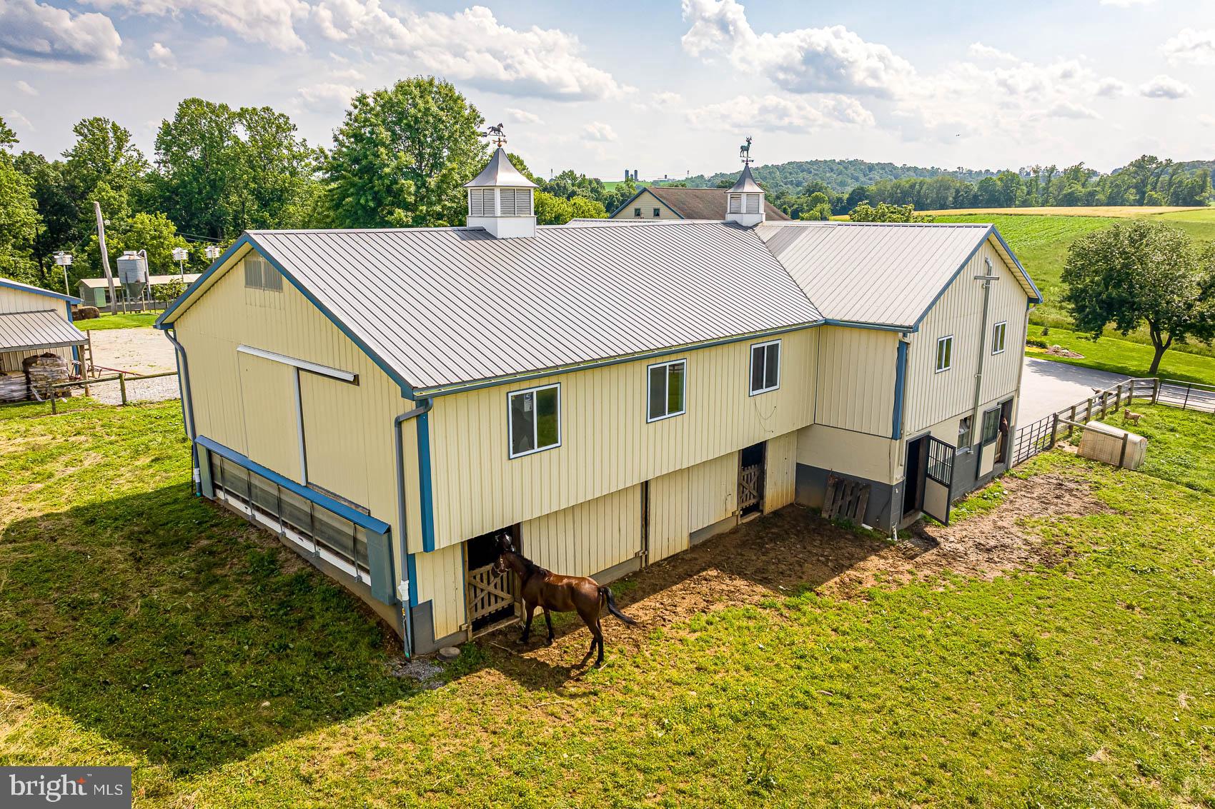 4360 Battlehill Road Brogue, PA 17309 - Photo 12 of 30 a aerial view of a house with a yard table and chairs