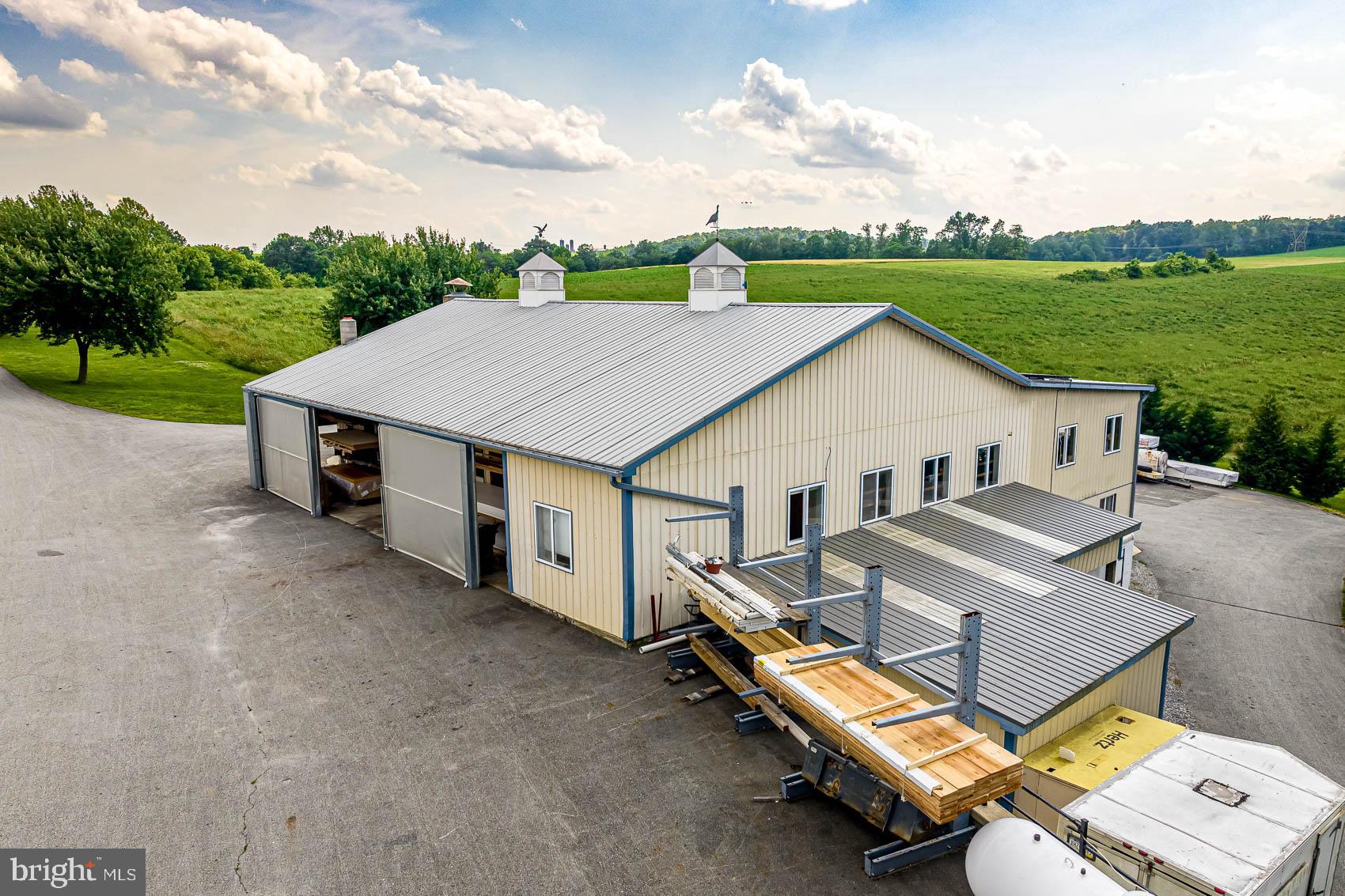 4360 Battlehill Road Brogue, PA 17309 - Photo 15 of 30 a view of a house with a big yard and large trees