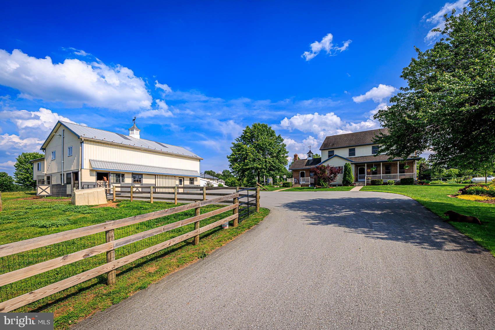 4360 Battlehill Road Brogue, PA 17309 - Photo 22 of 30 a view of a house with a big yard and large trees