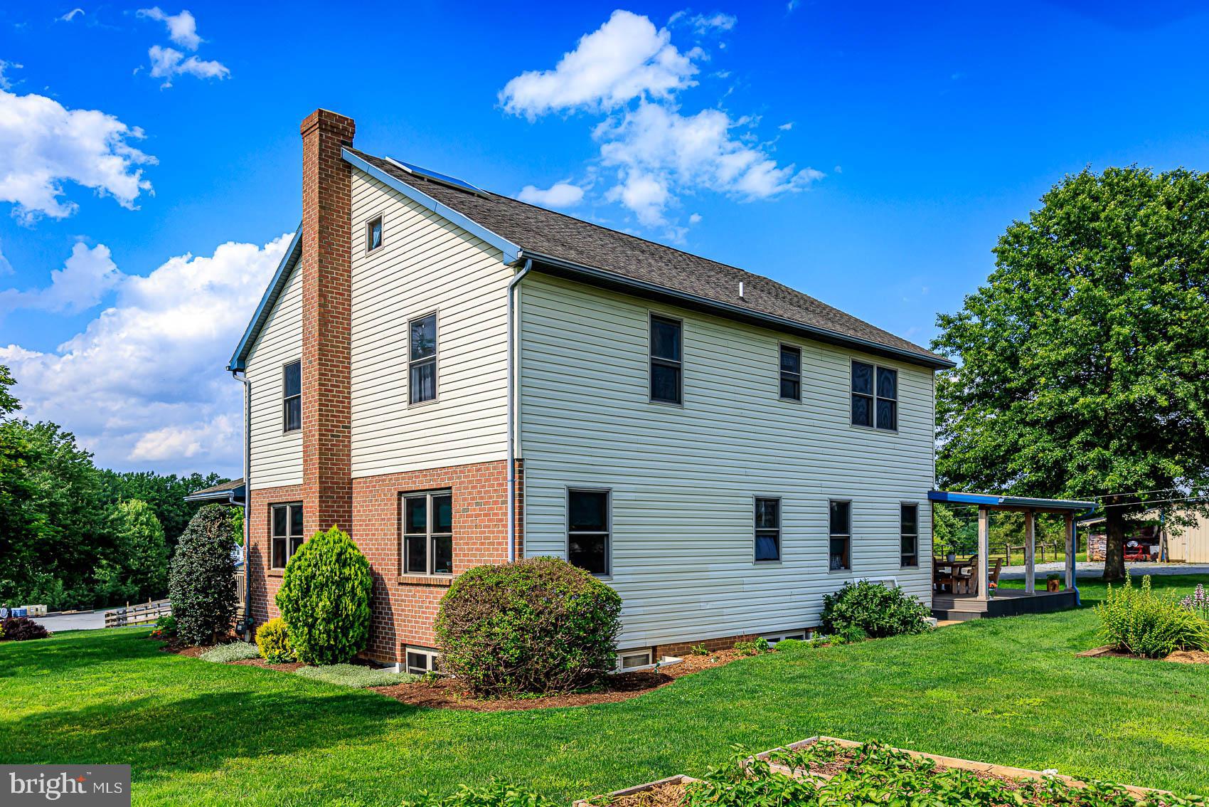 4360 Battlehill Road Brogue, PA 17309 - Photo 3 of 30 a front view of a house with a garden