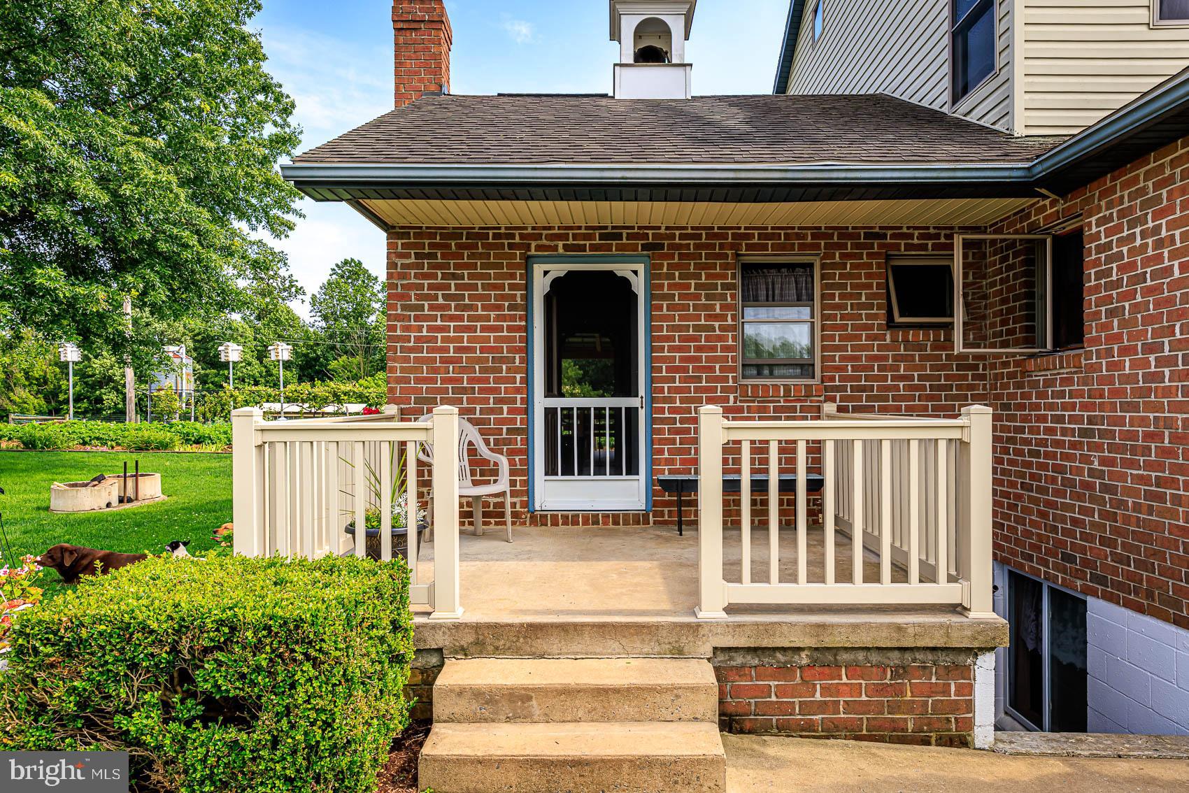 4360 Battlehill Road Brogue, PA 17309 - Photo 5 of 30 a front view of a house with garden
