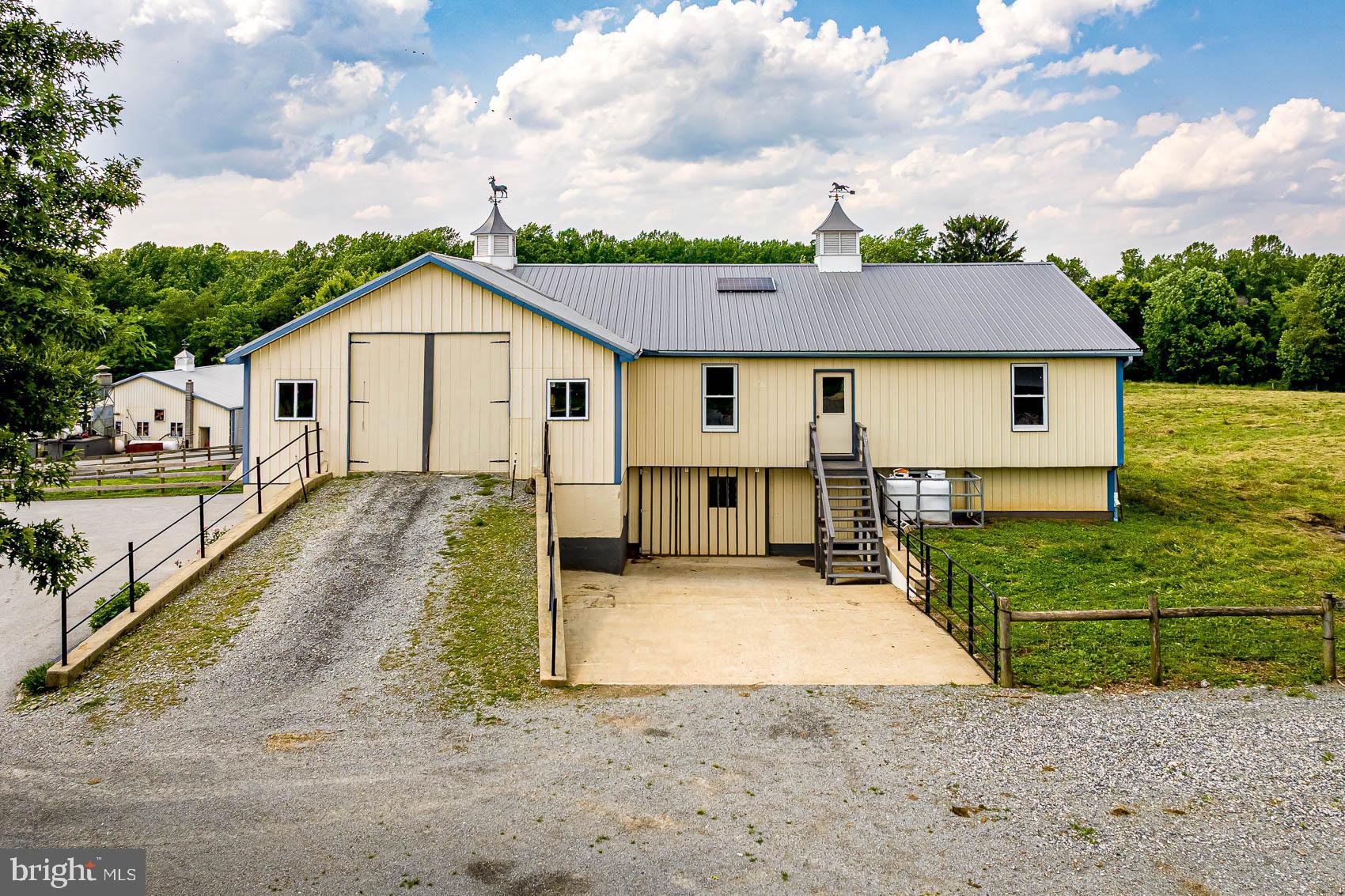 4360 Battlehill Road Brogue, PA 17309 - Photo 8 of 30 a view of a white house that has tree in front of it