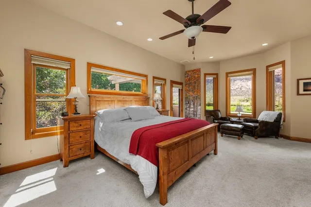 a bed room with a bed and a couch