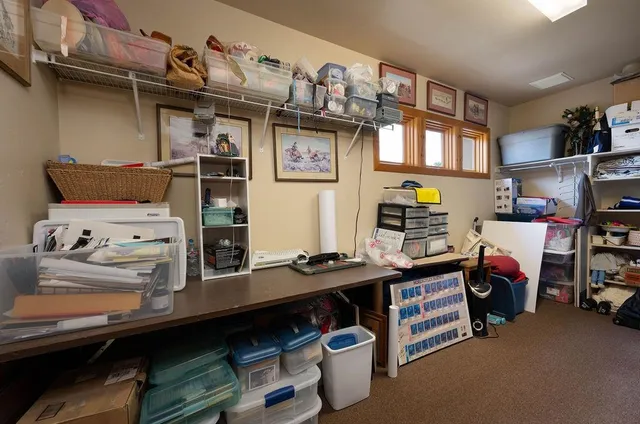 a room with furniture and a desk