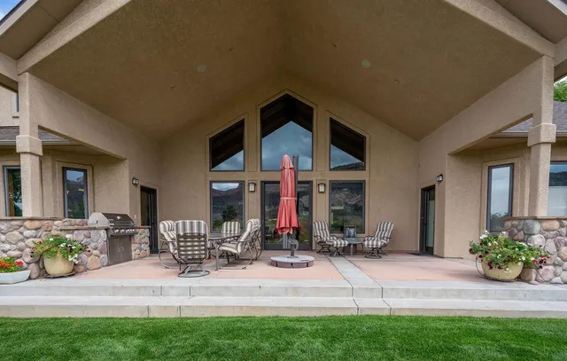 a view of house with yard and outdoor space