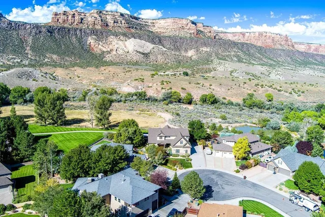 a view of a city with mountains in the background