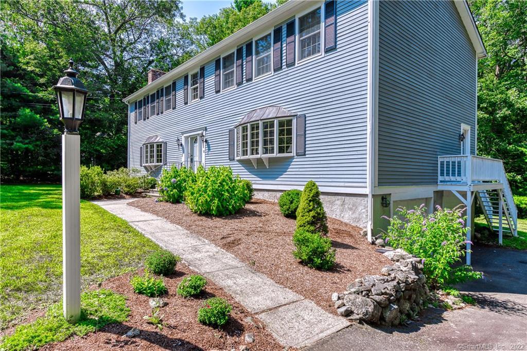 a house that has a lot of plants in it