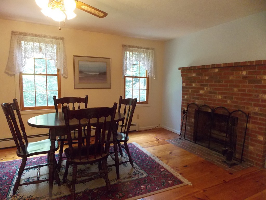 48 Simonds Hill Road Hubbardston, MA 01452 - Photo 13 of 25 a view of a dining room with furniture and window