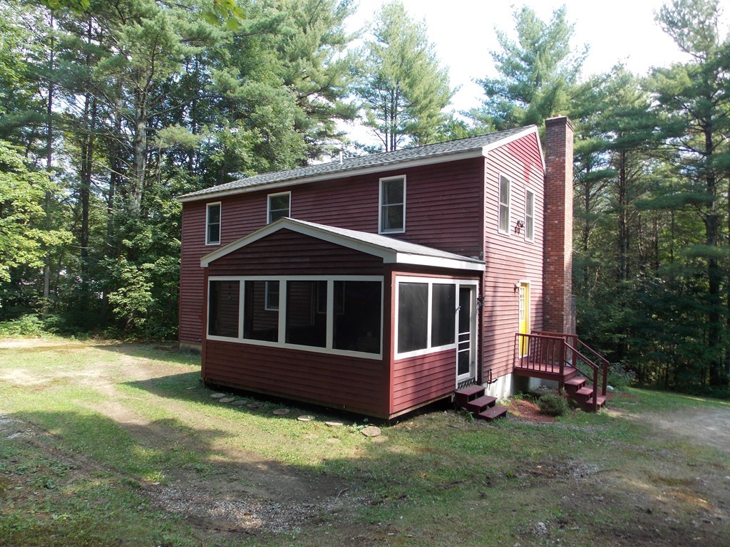 48 Simonds Hill Road Hubbardston, MA 01452 - Photo 3 of 25 a view of backyard with deck and entertaining space