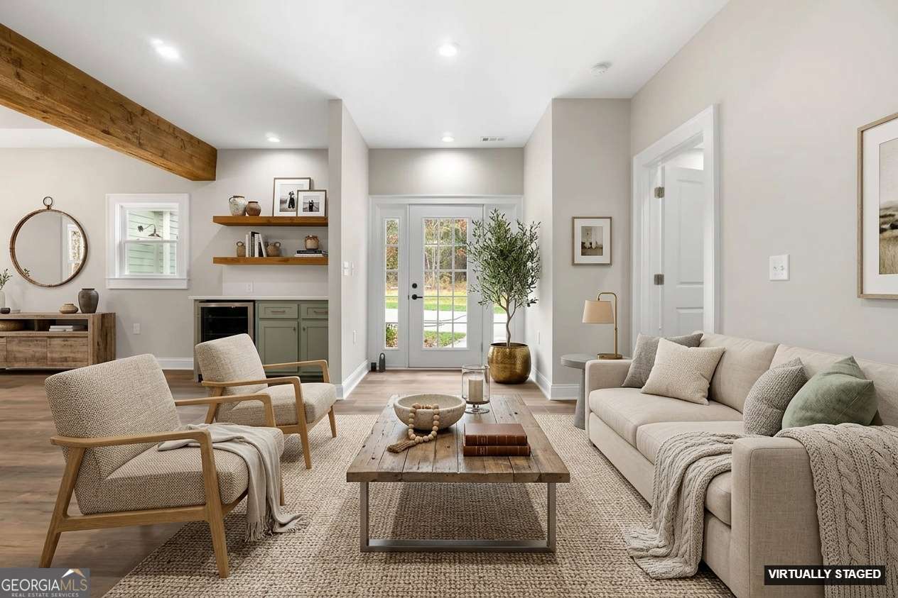 164 I I Walker Brooks Road Newnan, GA 30263 - Photo 15 of 54 a living room with furniture fireplace and a large window