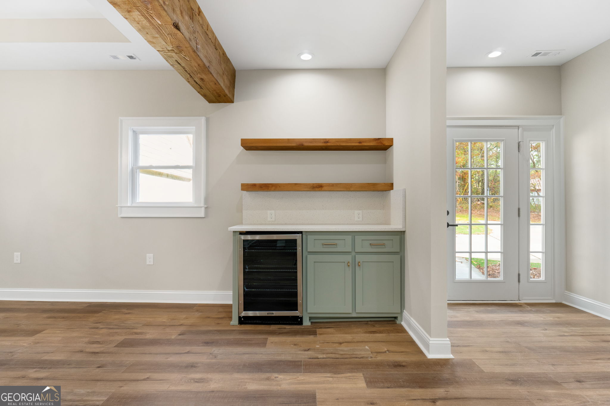 164 I I Walker Brooks Road Newnan, GA 30263 - Photo 25 of 54 an empty room with windows and fireplace