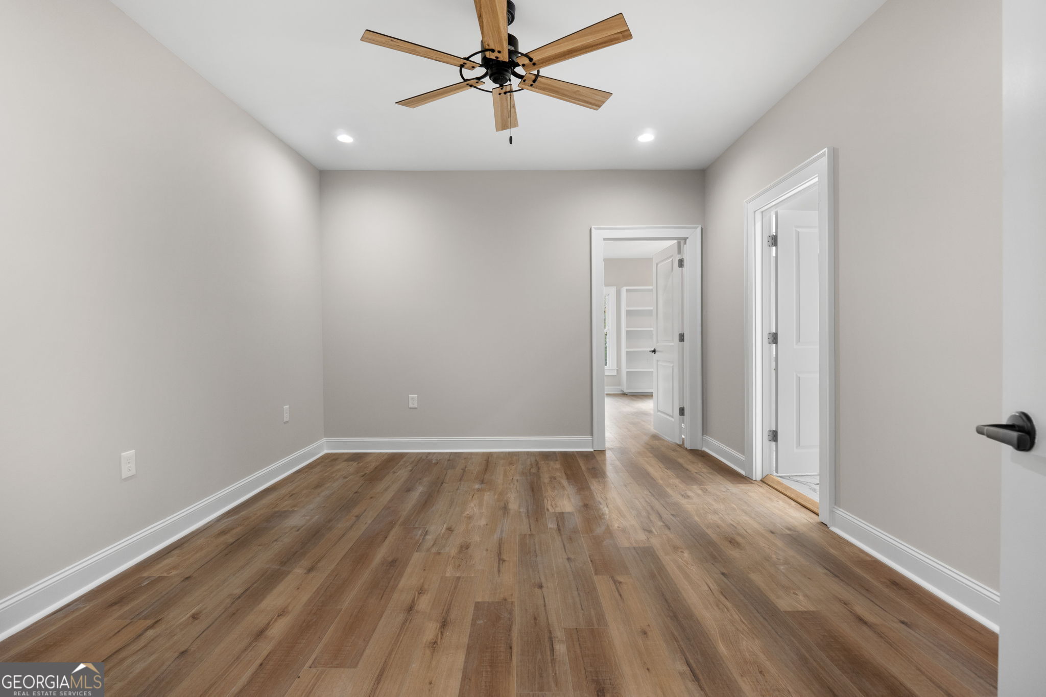 164 I I Walker Brooks Road Newnan, GA 30263 - Photo 27 of 54 wooden floor in an empty room with a window