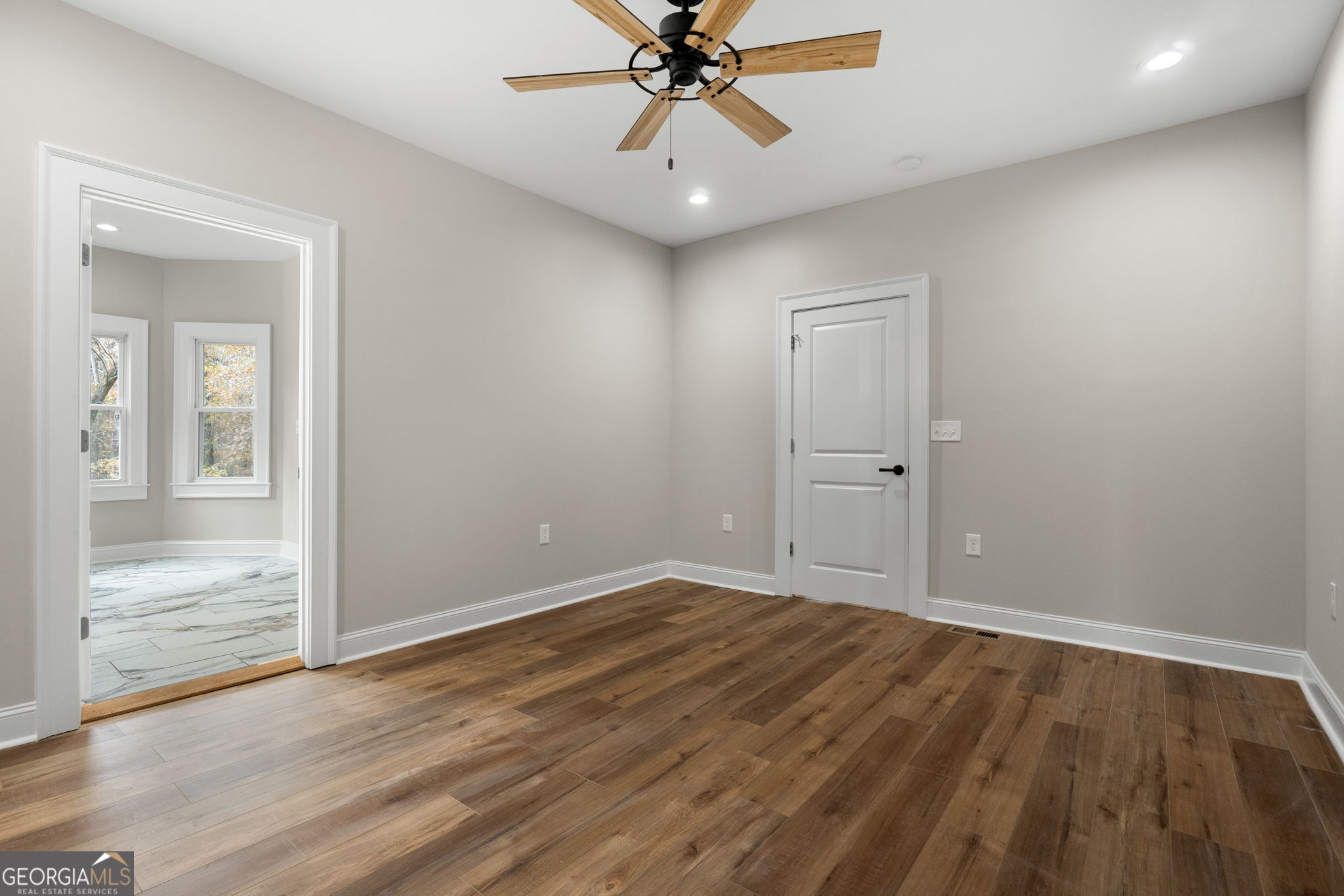 164 I I Walker Brooks Road Newnan, GA 30263 - Photo 29 of 54 wooden floor in an empty room